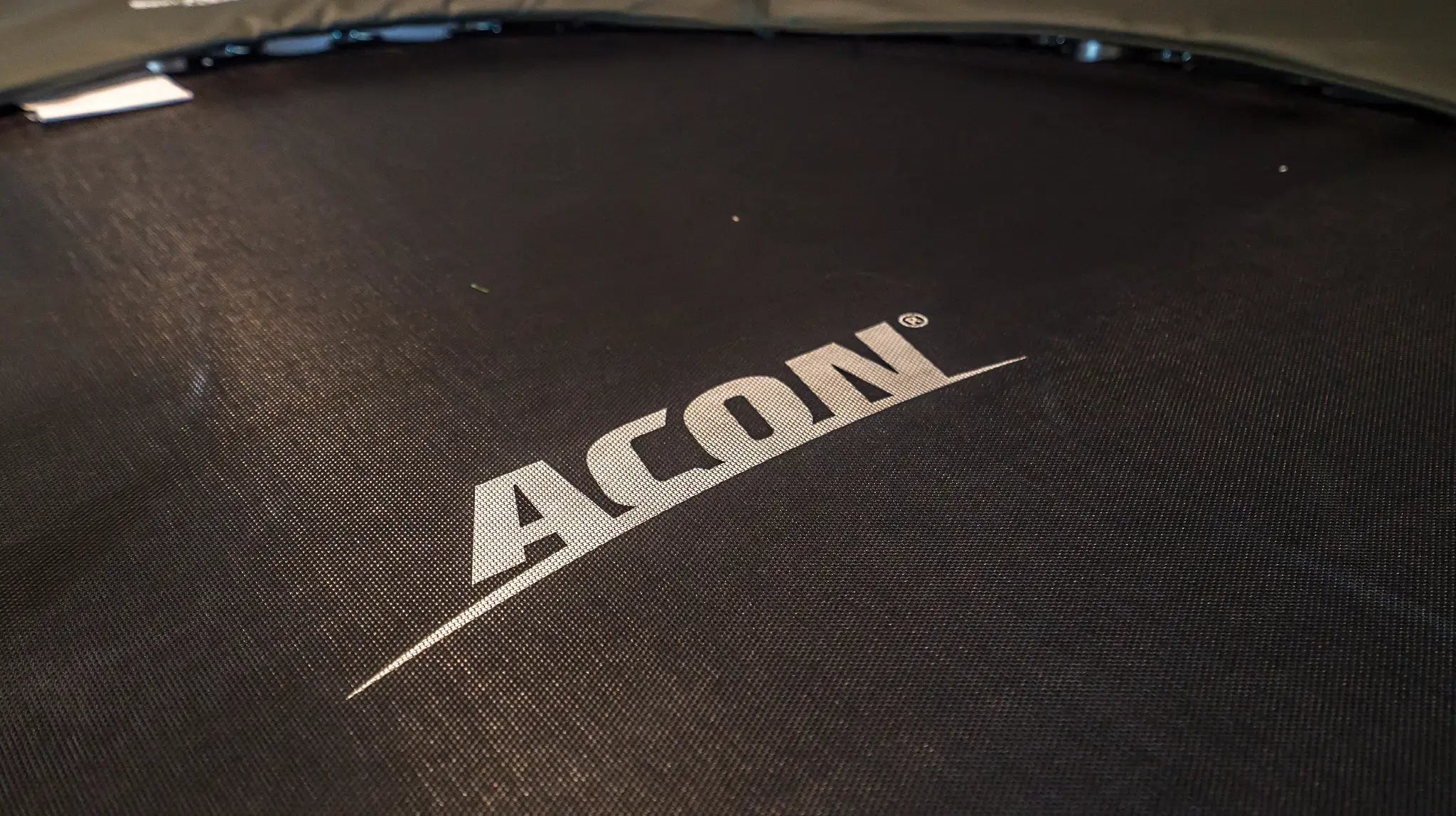 Close up of acon trampoline mat.