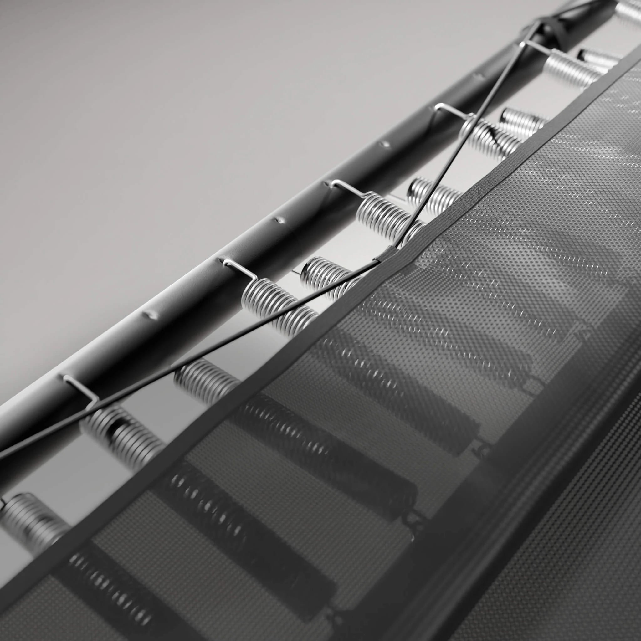 Detail of the skirt covering the springs of the Acon 13 HD trampoline and the double-level spring adjustment.