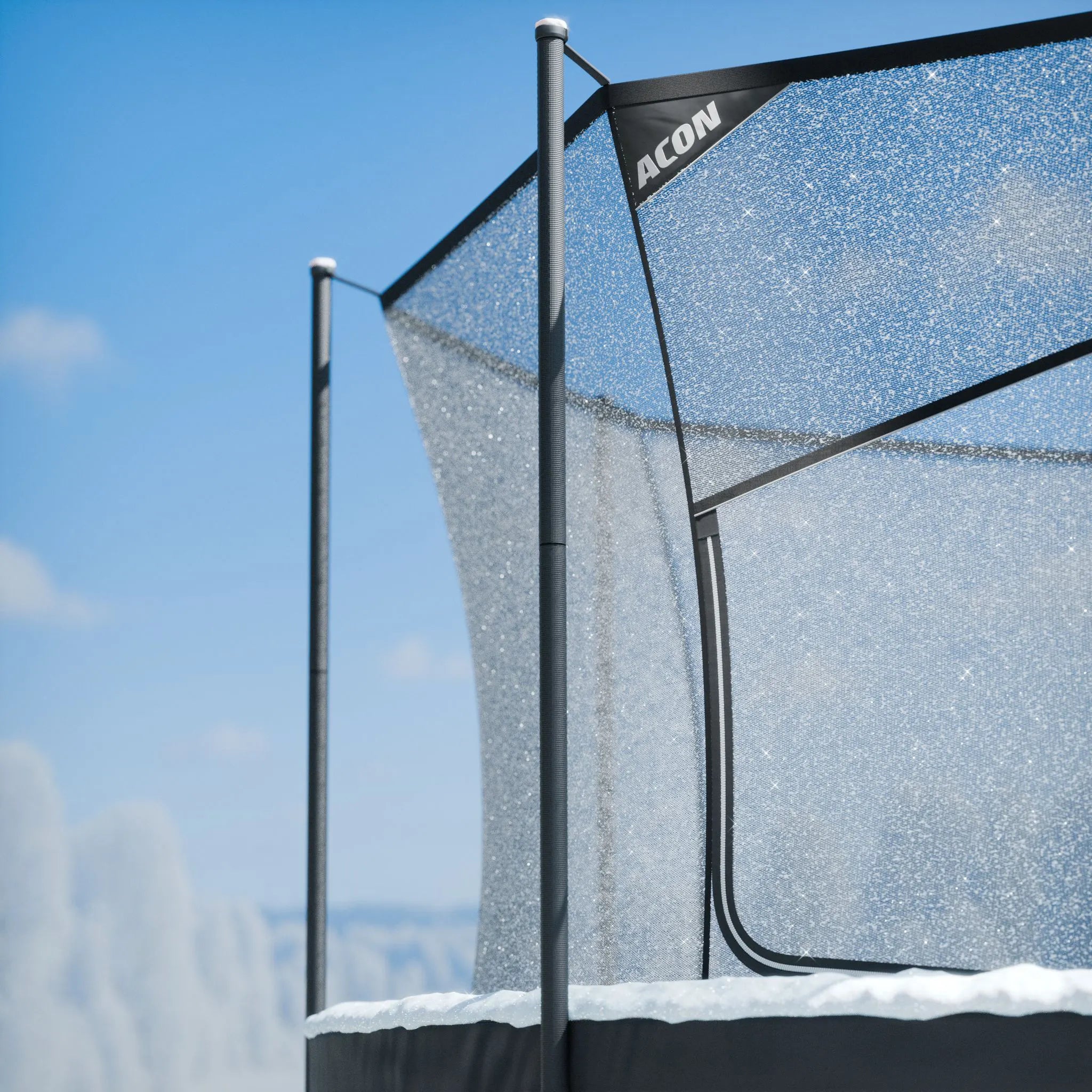 Close-up of the Acon 4.3m trampoline safety net in a snowy winter setting, showing durable enclosure materials used in high‑quality 4.3m trampolines.