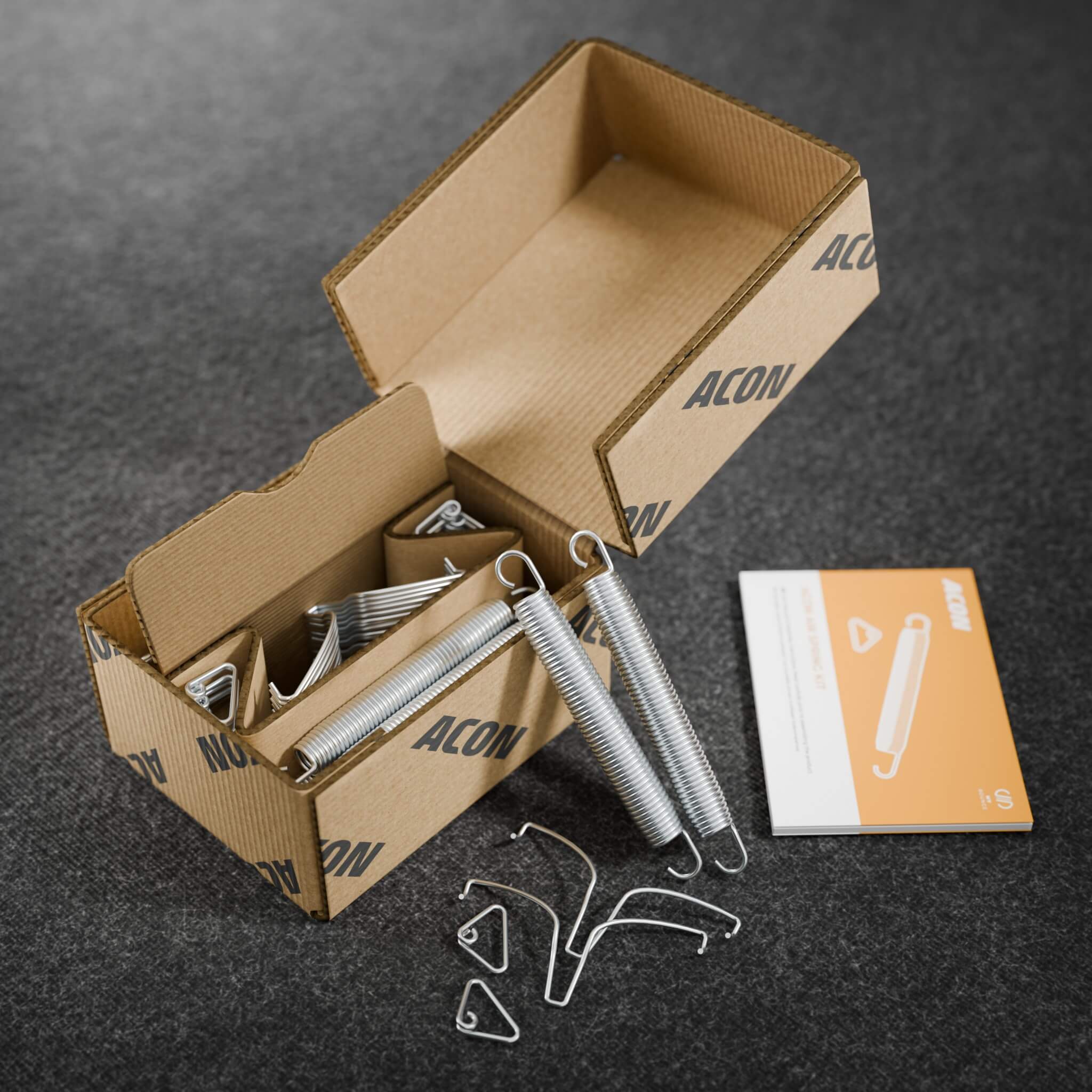 Acon Air Spring Kit packaging with complete spring set. Includes all parts to add more springs for stable and controlled bouncing.