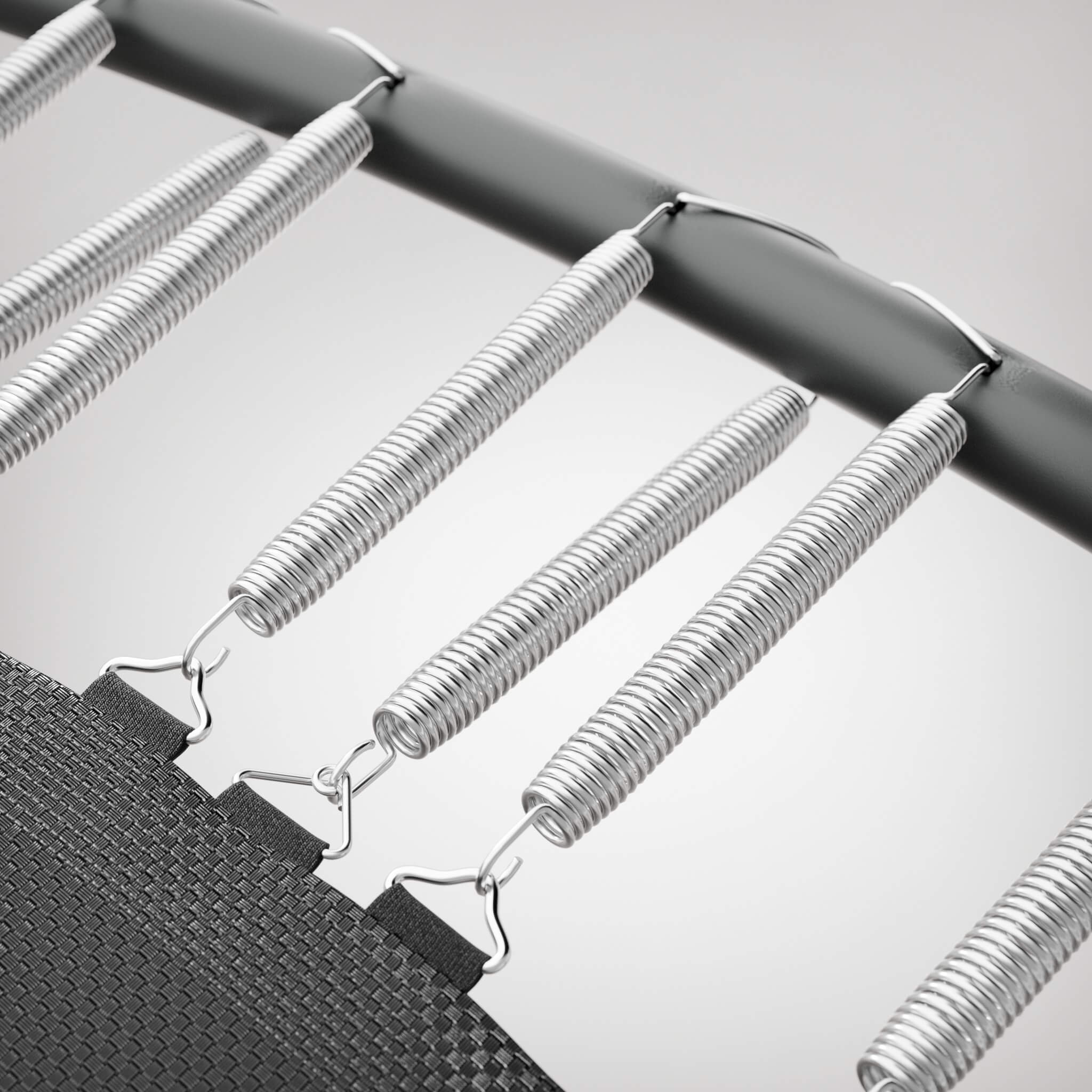Close-up of Acon trampoline springs installed for improved stability and controlled bounce. Add extra springs for better support.