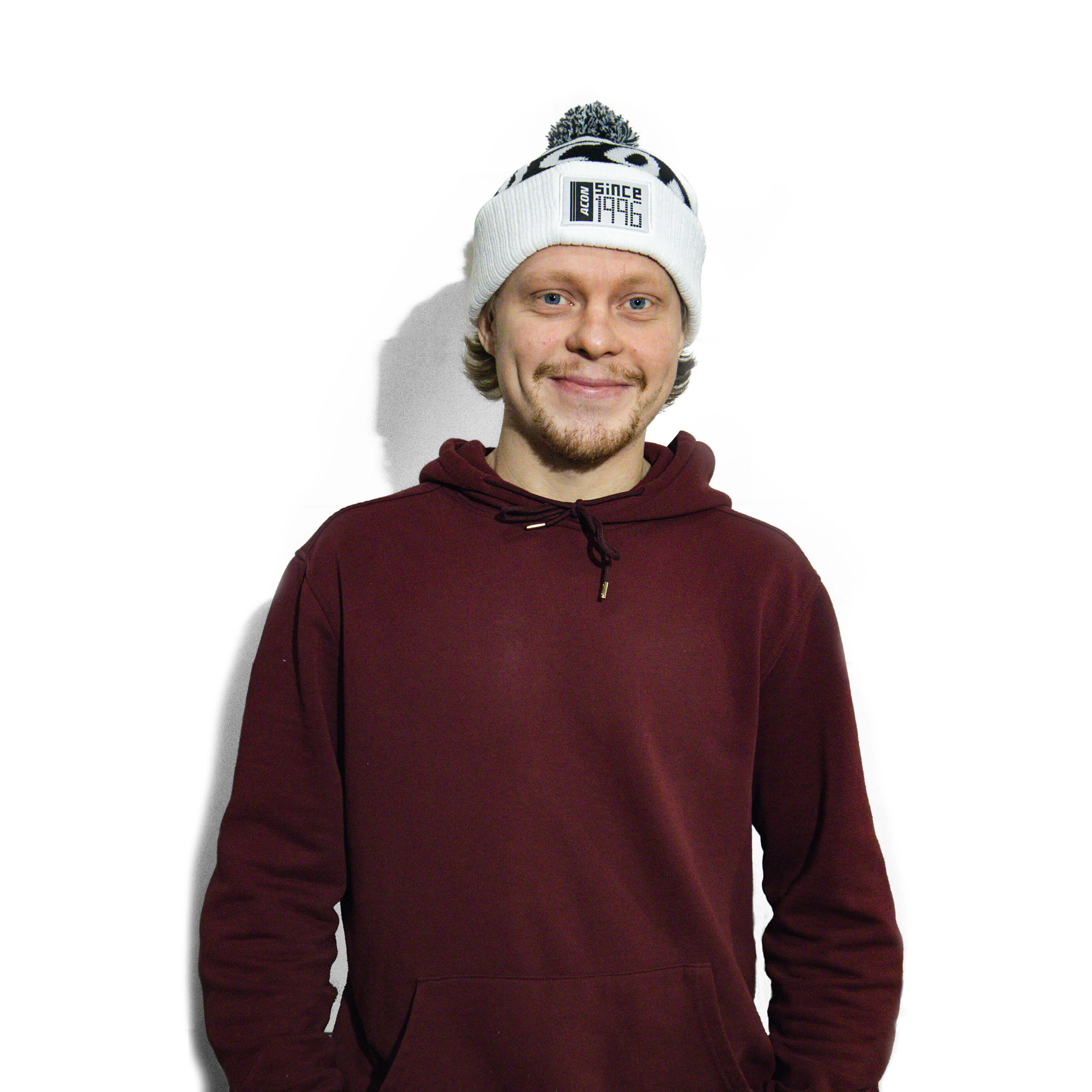 An image of a young, Caucasian boy wearing the Acon Blk/Whi Beanie in a studio.