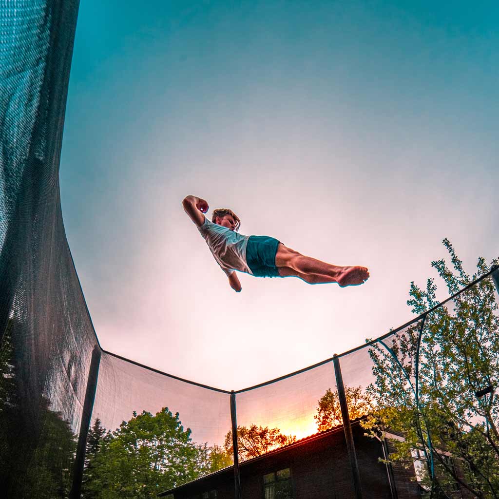 Boy bouncing on ACON Air 16 Trampoline.